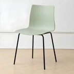 Modern plastic and acrylic side chair with metal legs, ideal for kitchen and dining rooms