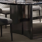 Oval dining table with black marble top and trestle metal base, modern dining room set