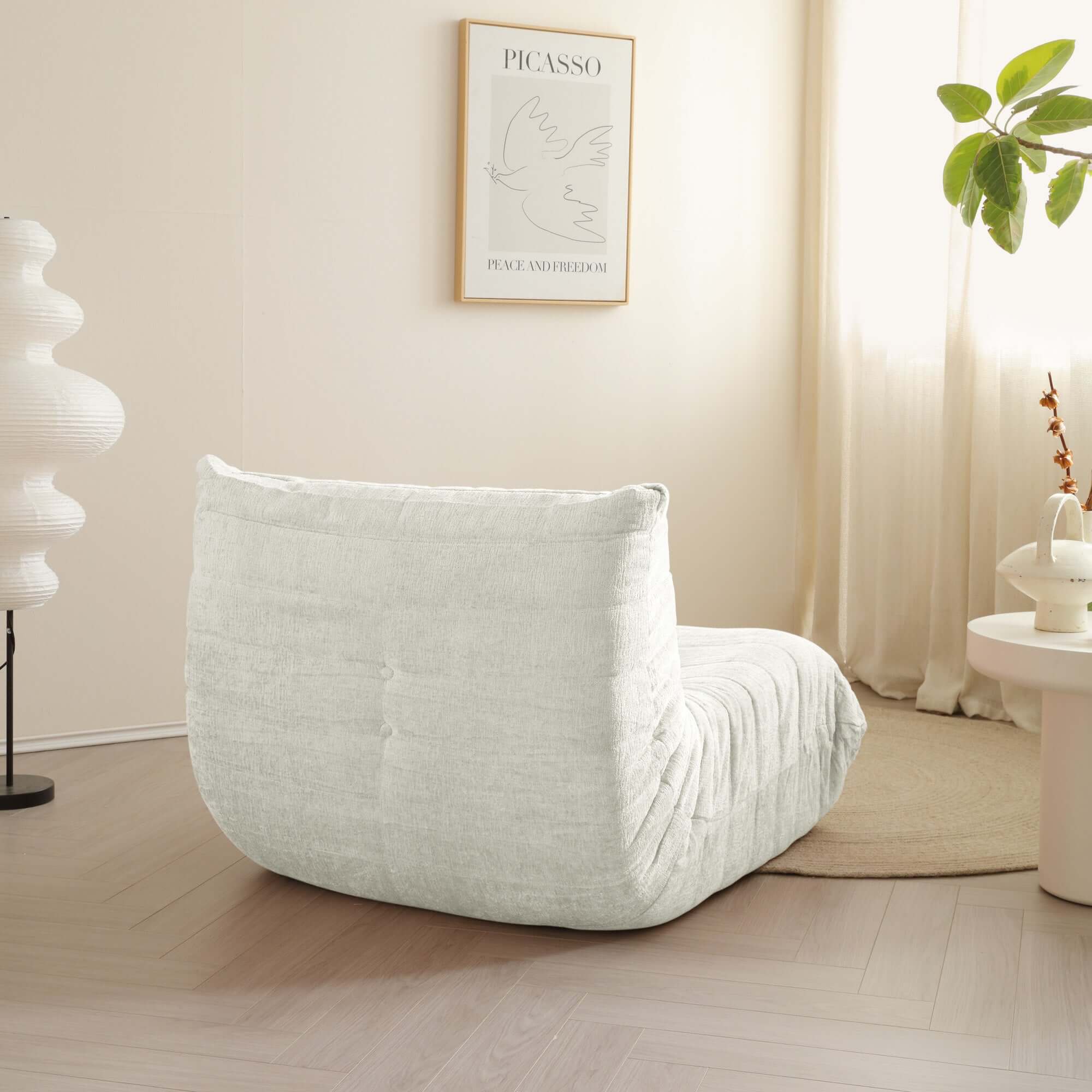 Comfortable lazy compressed foam floor couch shaped like a caterpillar, perfect as a Togo sofa chair
