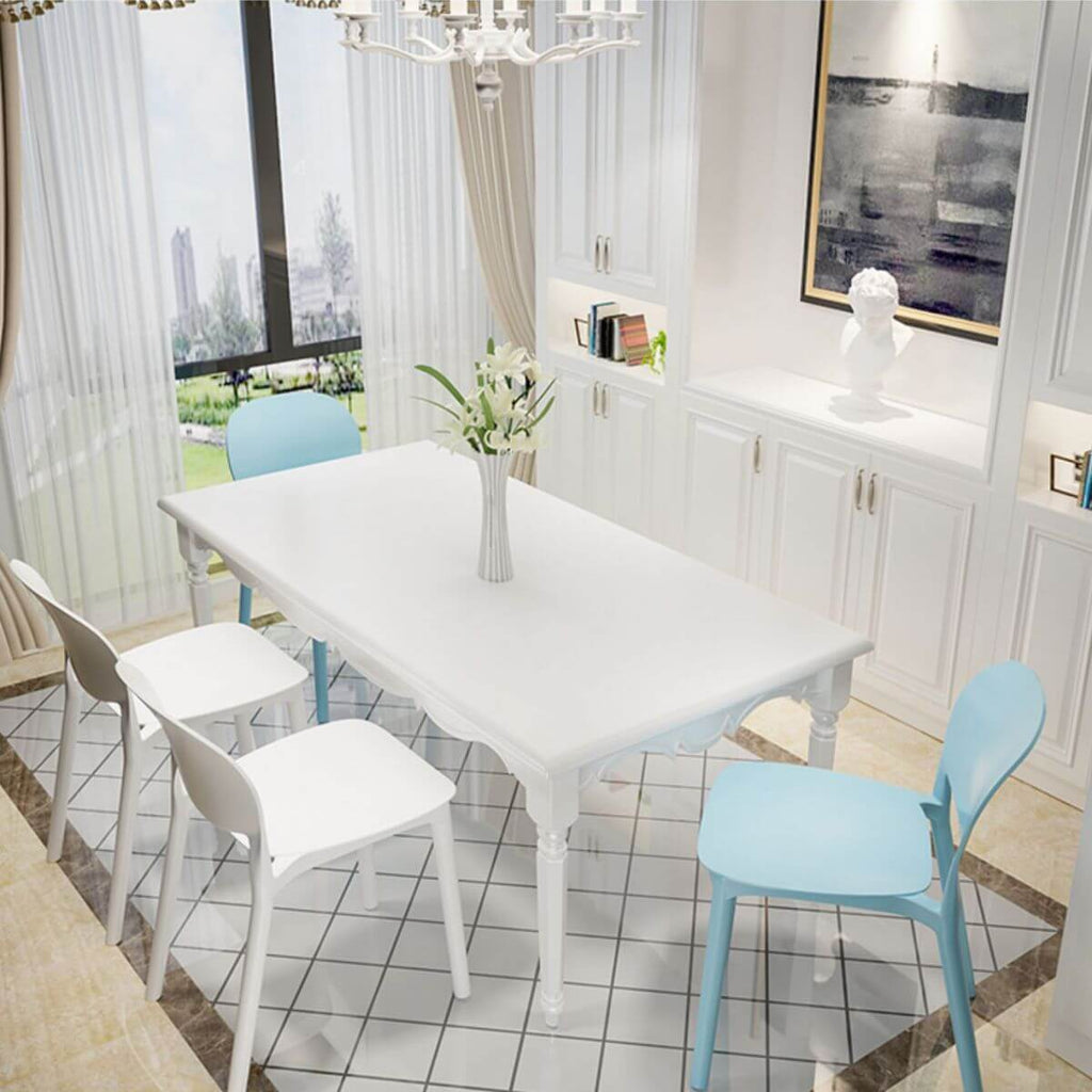 Stackable Nordic dining chair with acrylic legs and ergonomic backrest for modern dining rooms