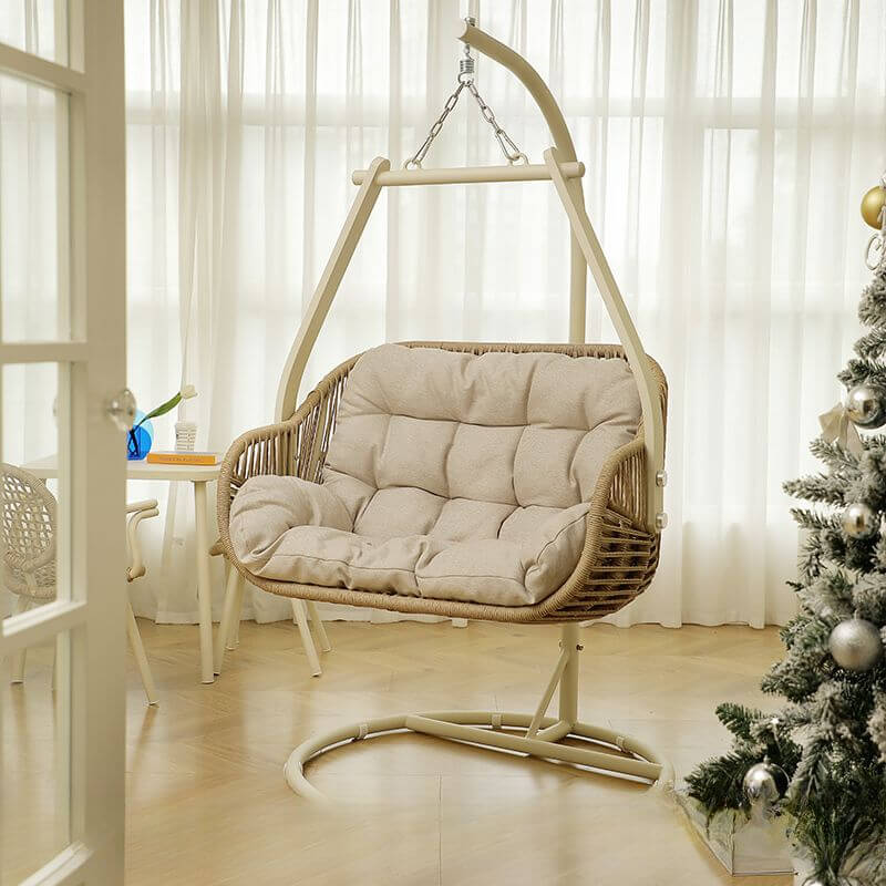 Tropical cocoa and cream upholstered porch swing with alloy frame, stand, and chain included