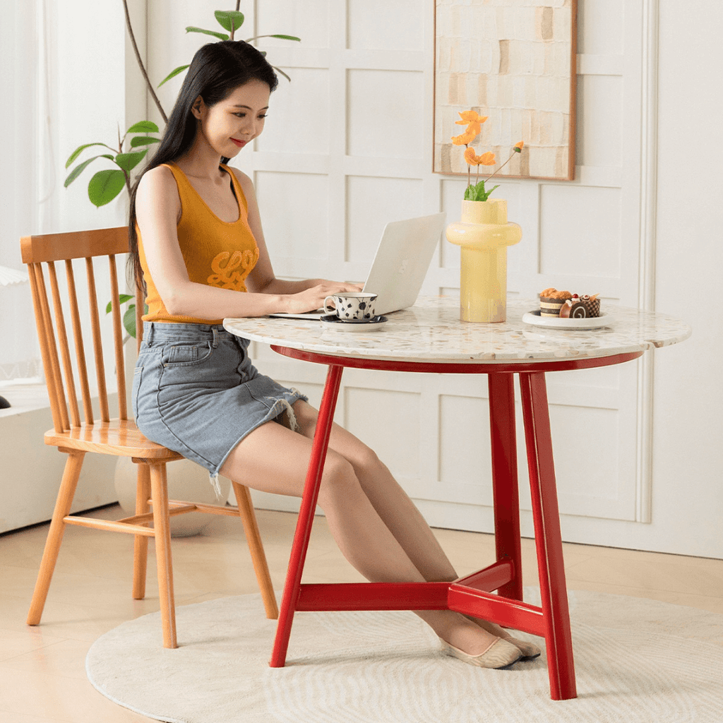 Modern terrazzo dining table with sleek design, perfect for cozy meals and home office use