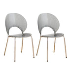 Stackable acrylic dining chair with open back and metal legs, armless design for modern dining rooms