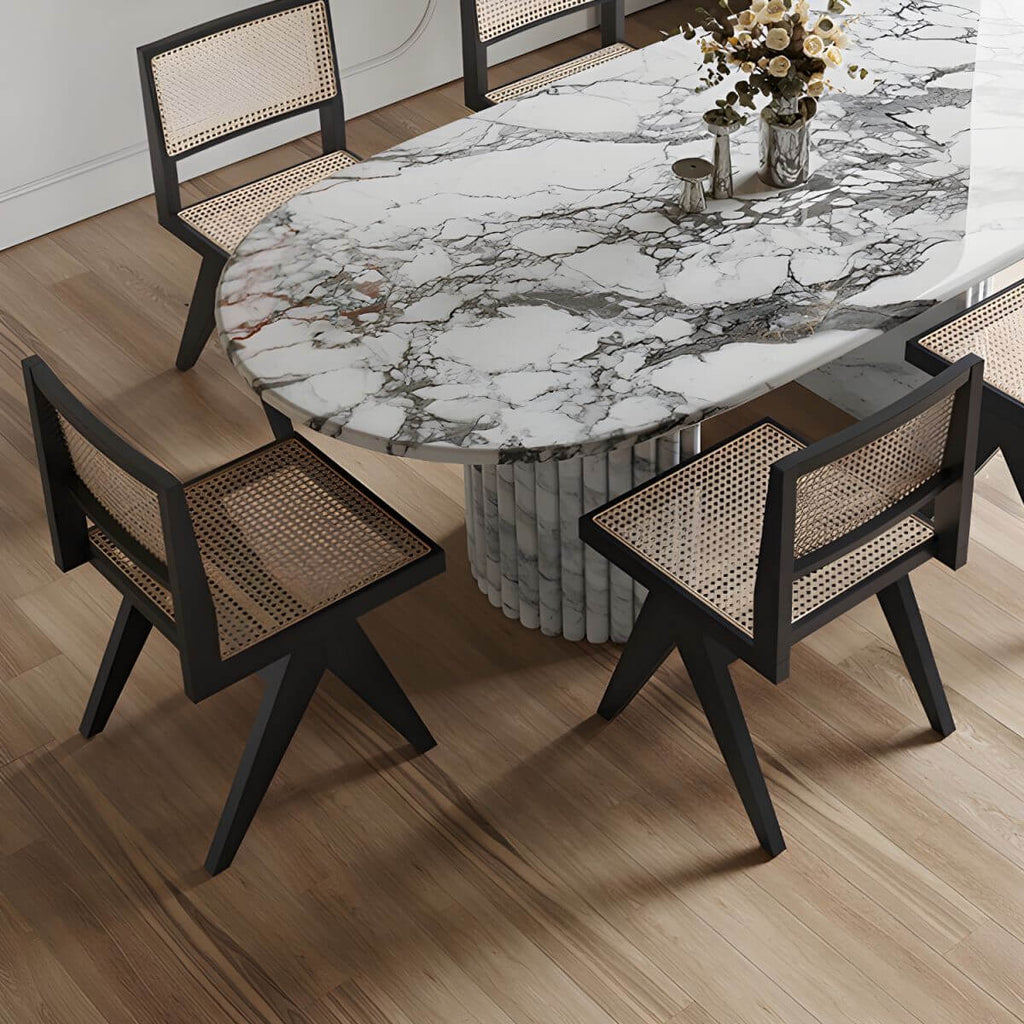 Modern oval marble dining table with white double pedestal base for stylish dining rooms