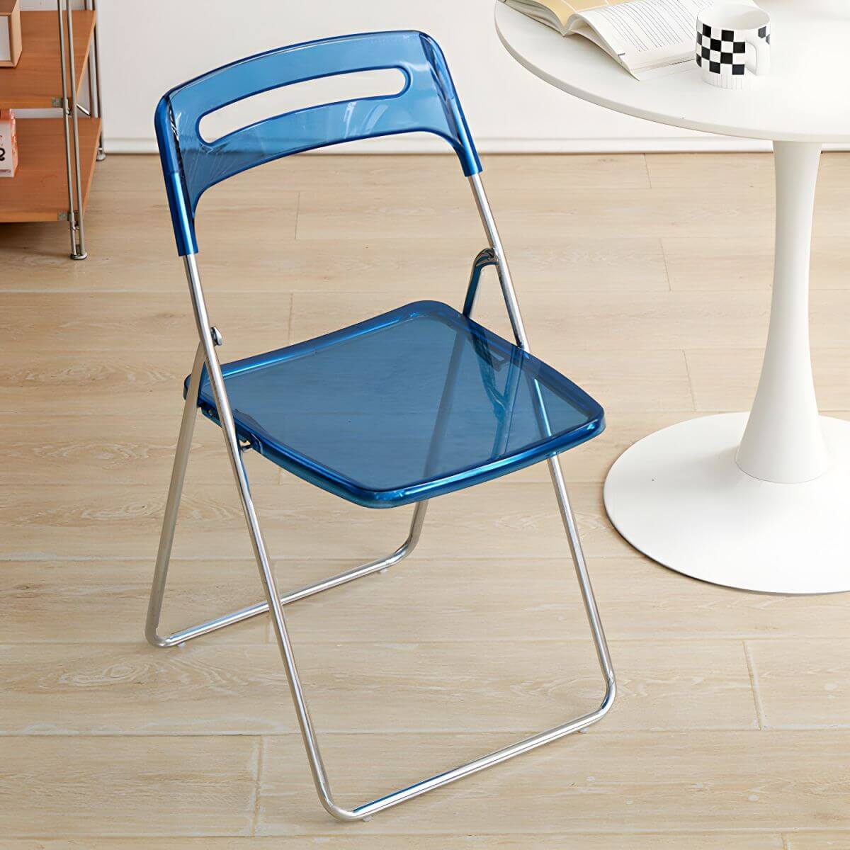 Modern collapsible open back side chair made of plastic and acrylic, ideal for kitchen and dining areas