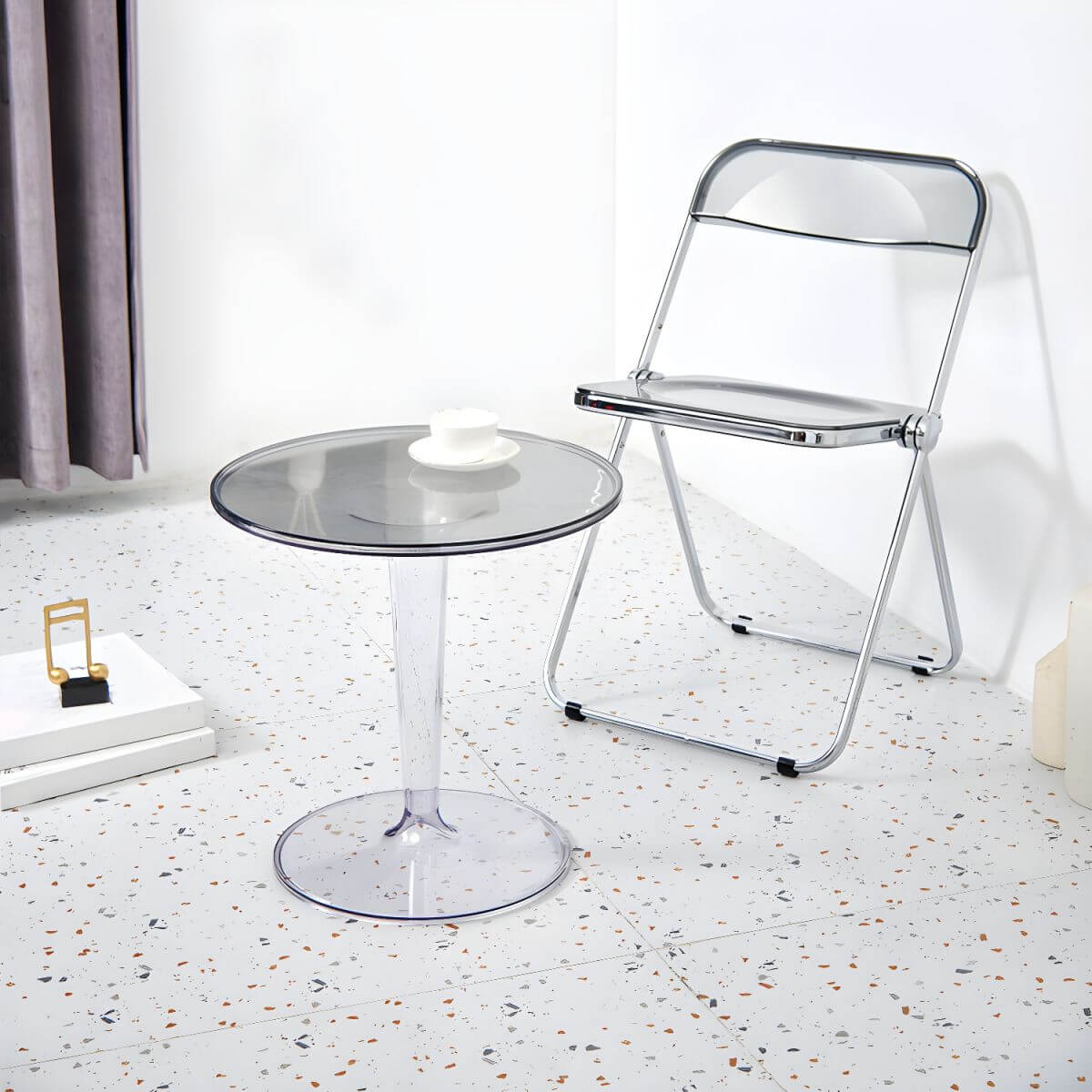 Scandinavian style dining chair with silver metal legs and plastic acrylic seat