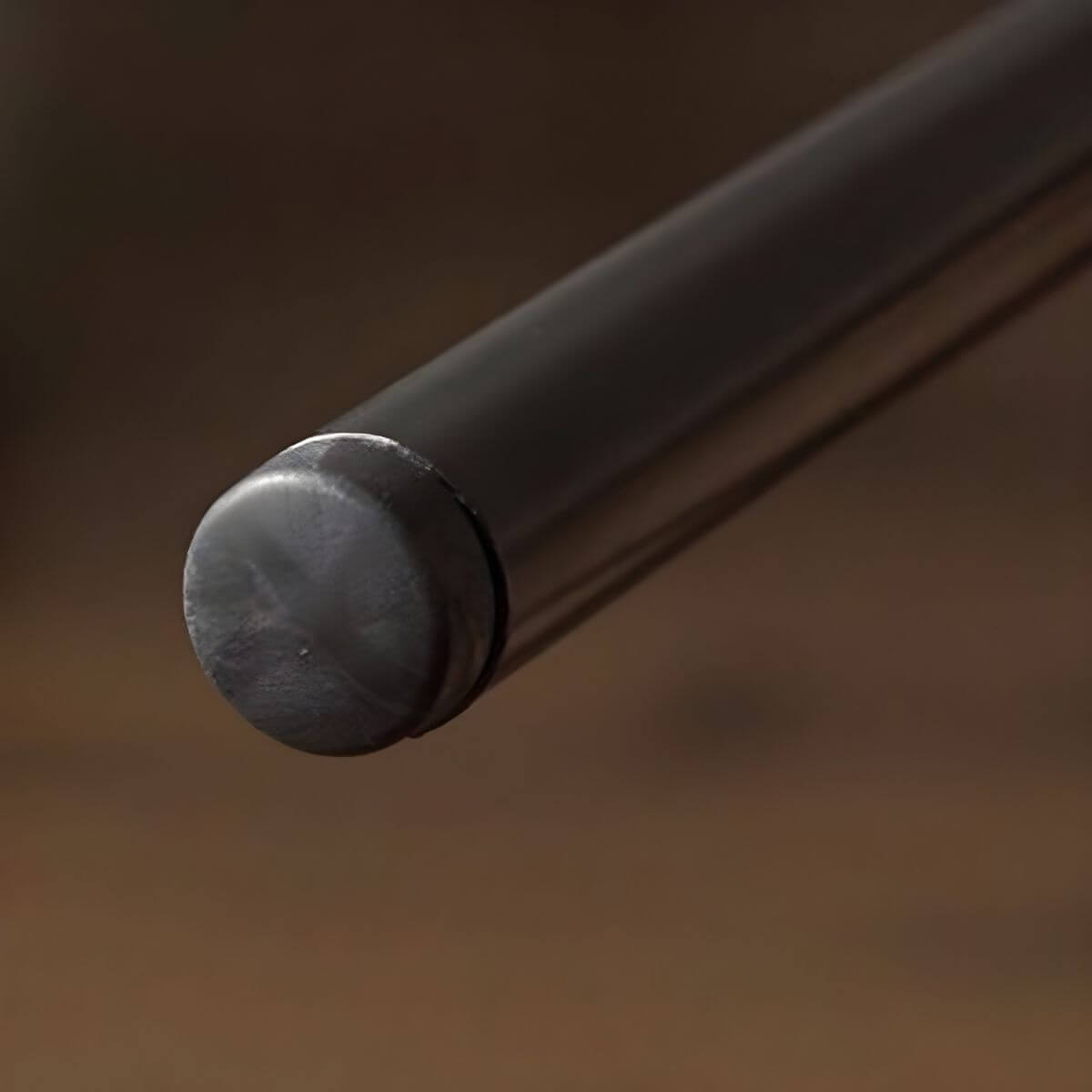 Mid century modern 2-seater sofa with black metal frame and solid wood arms