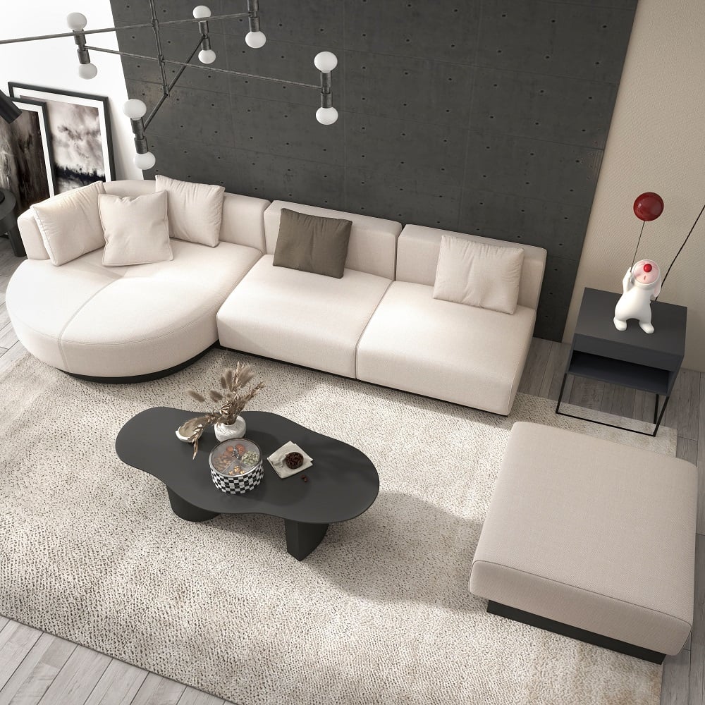 Beige modern L-shaped sectional sofa with pillows and black legs, perfect for corner seating