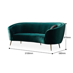 Luxurious emerald green velvet couch with elegant metal legs for fashionable home decor