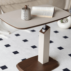 Movable end table in classic beige saddle leather, perfect for cozy living spaces