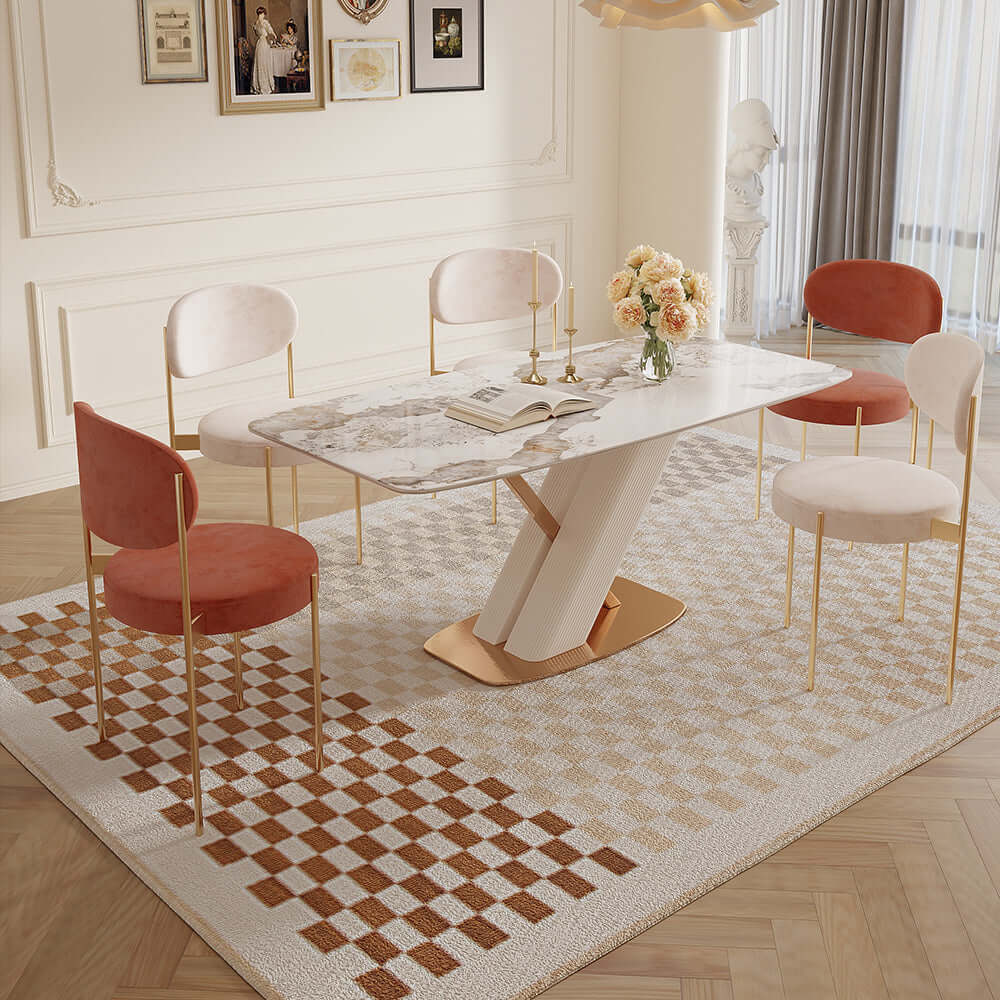 White rectangular marble dining table with gold stainless steel X-base, modern design