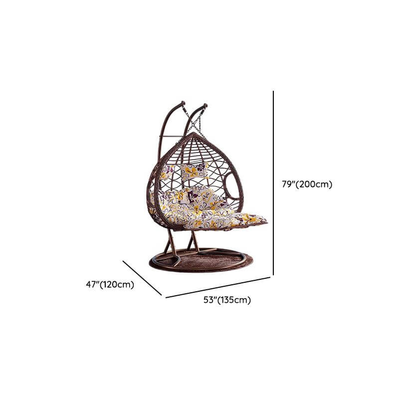 Metal porch swing with cushions, chain, and stand, designed to be heat resistant for outdoor use