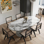Modern oval marble dining table with white double pedestal base for stylish dining rooms