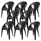 Stackable modern arm chair with open back made of plastic and acrylic for dining