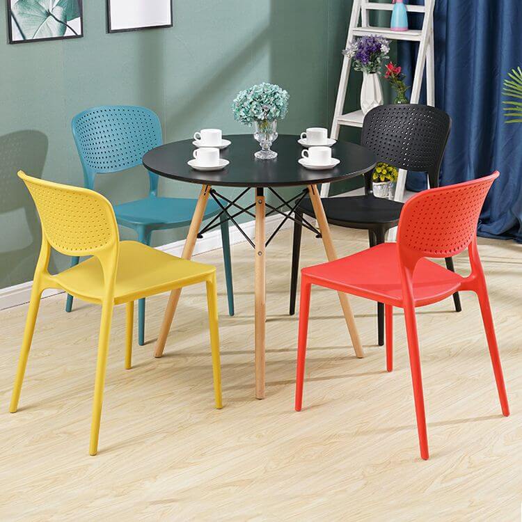 Stackable Scandinavian style plastic and acrylic side chair for dining room