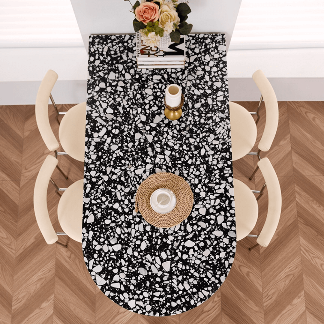 Half-elliptical terrazzo dining table with multicolor mosaic design, durable and stylish