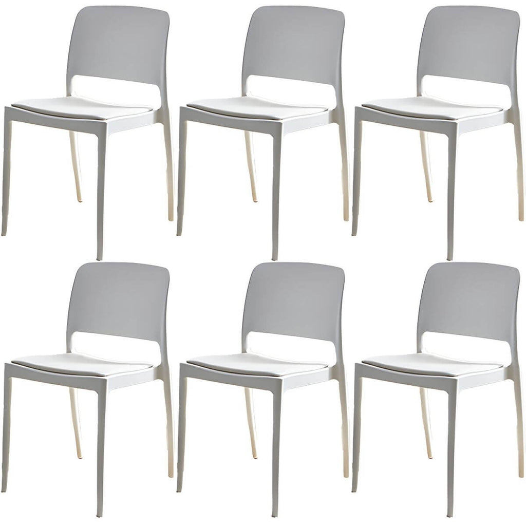 Scandinavian plastic and acrylic dining chair with low backrest and armless design