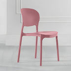 Stackable modern side chair with low back made of plastic and acrylic, perfect for contemporary dining