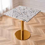 Modern marble table with sturdy metal base, perfect for adding a timeless aesthetic to any space