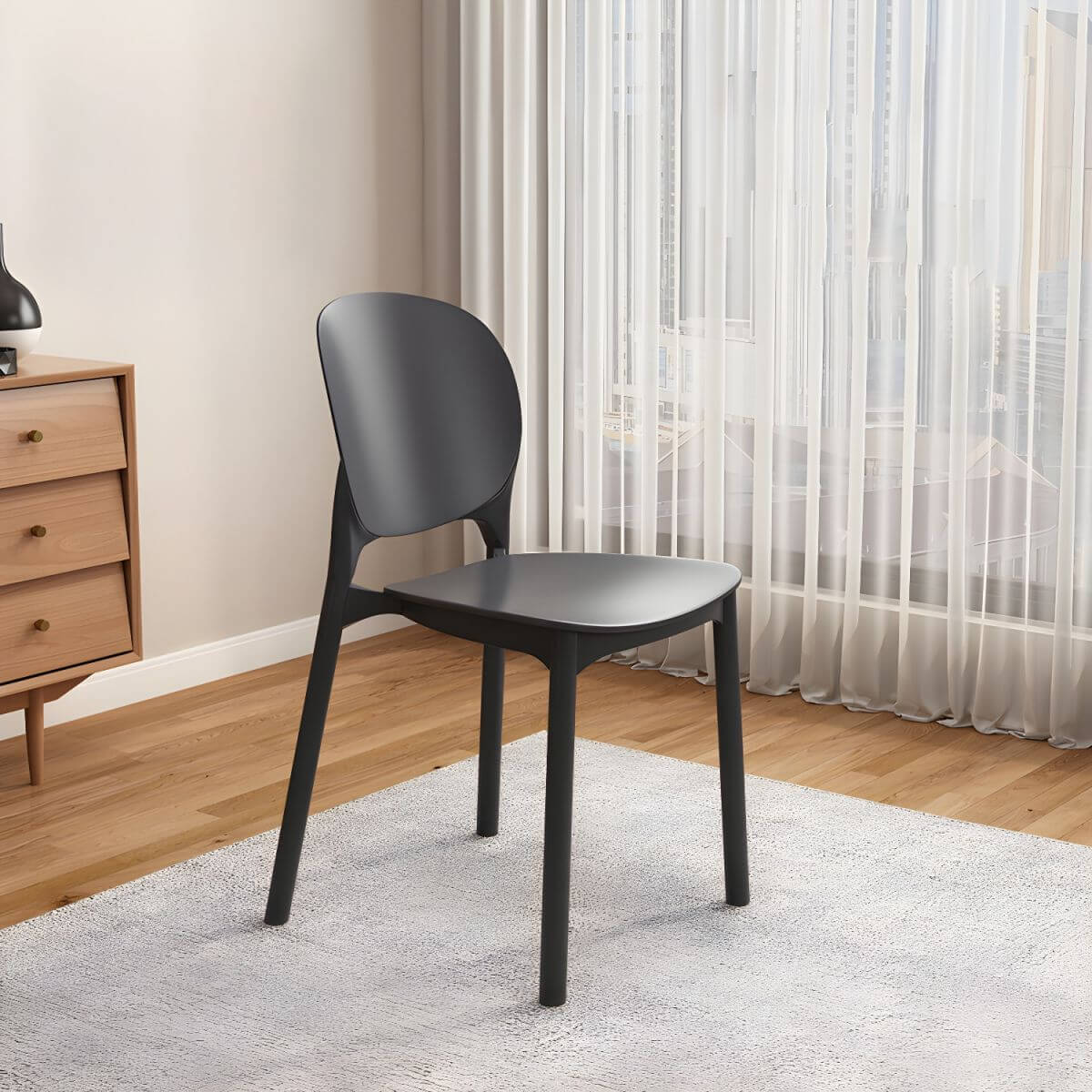 Stackable Scandinavian side chair with open back made of plastic and acrylic for dining