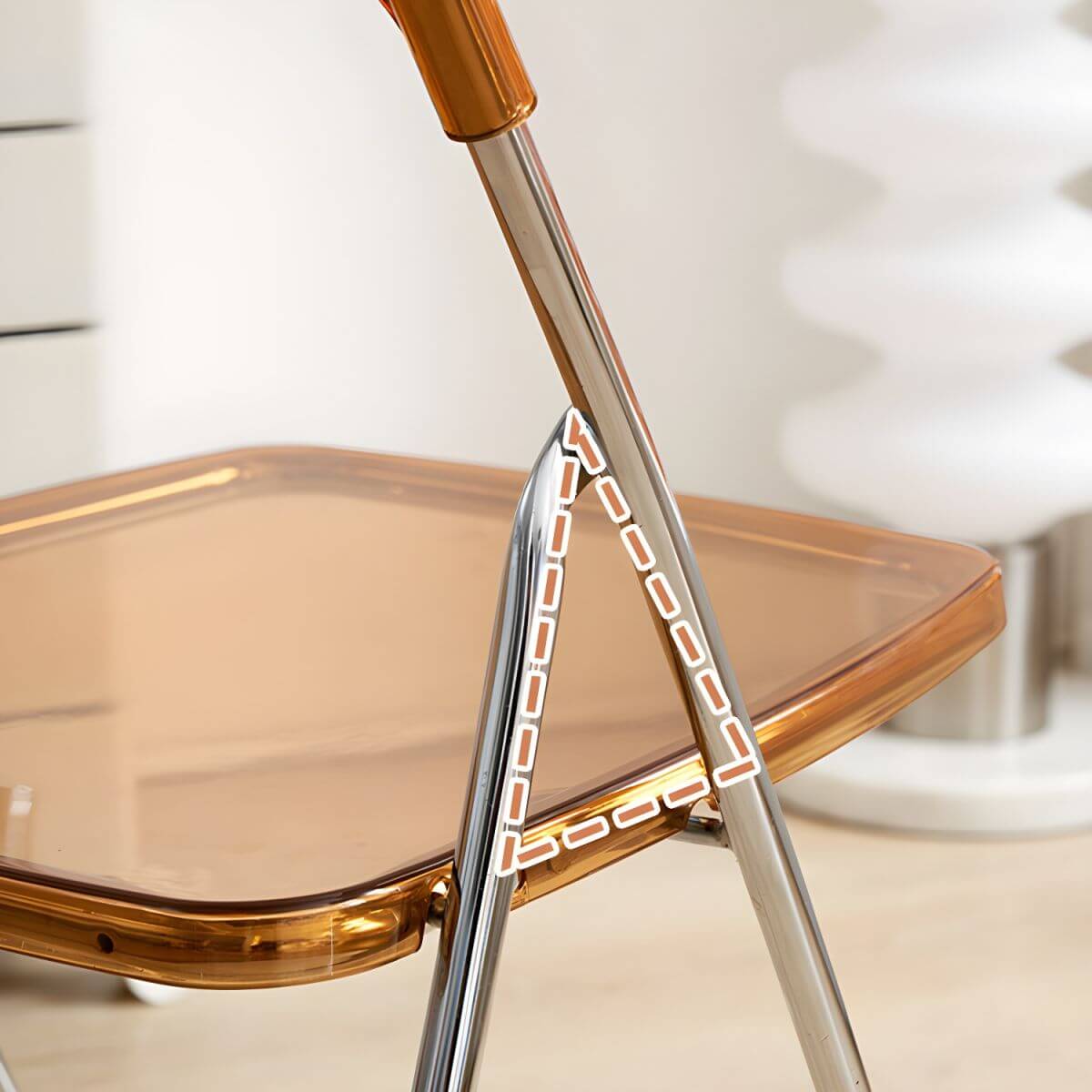 Modern collapsible open back side chair made of plastic and acrylic, ideal for kitchen and dining areas