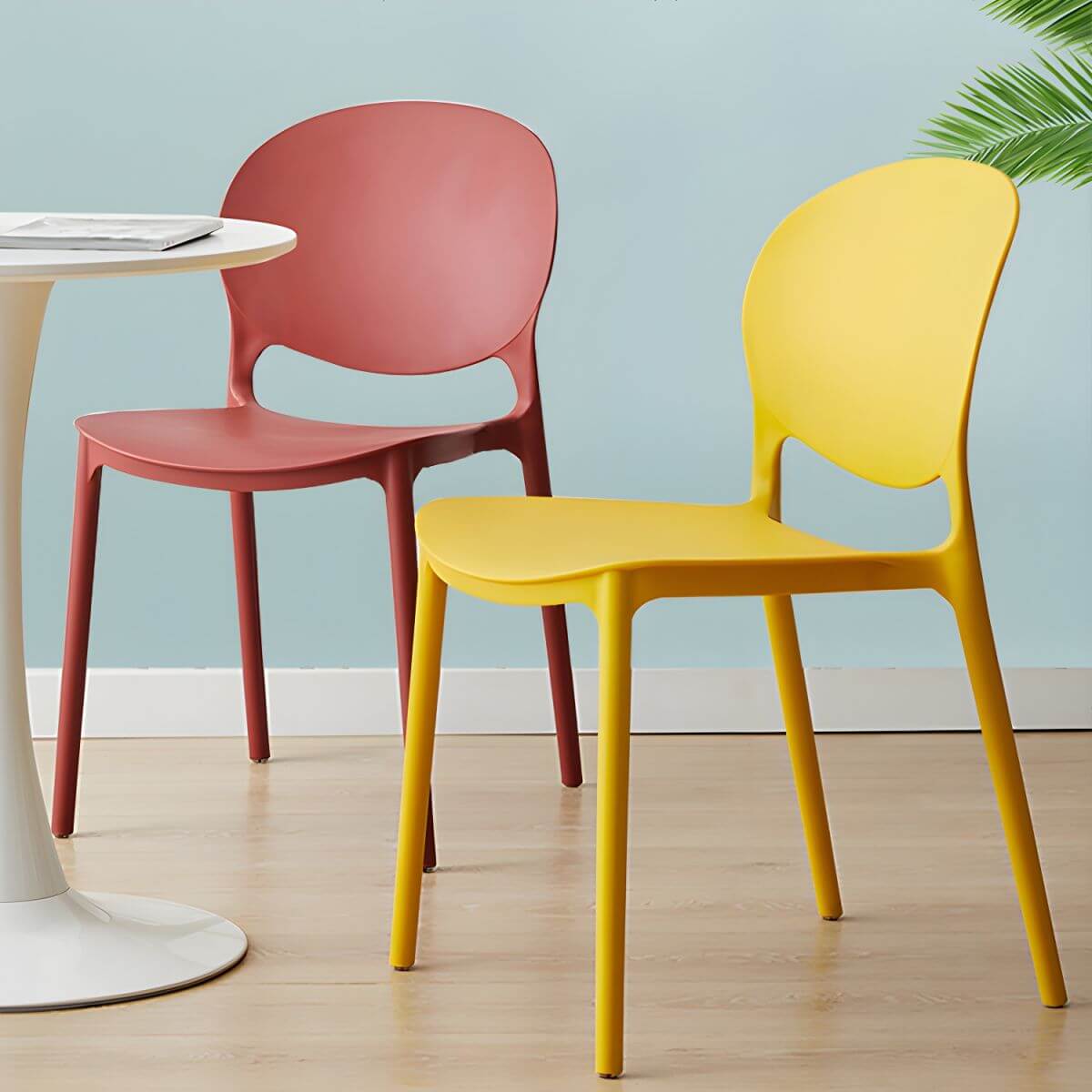 Scandinavian plastic dining chair with open back and four legs, ideal for home use