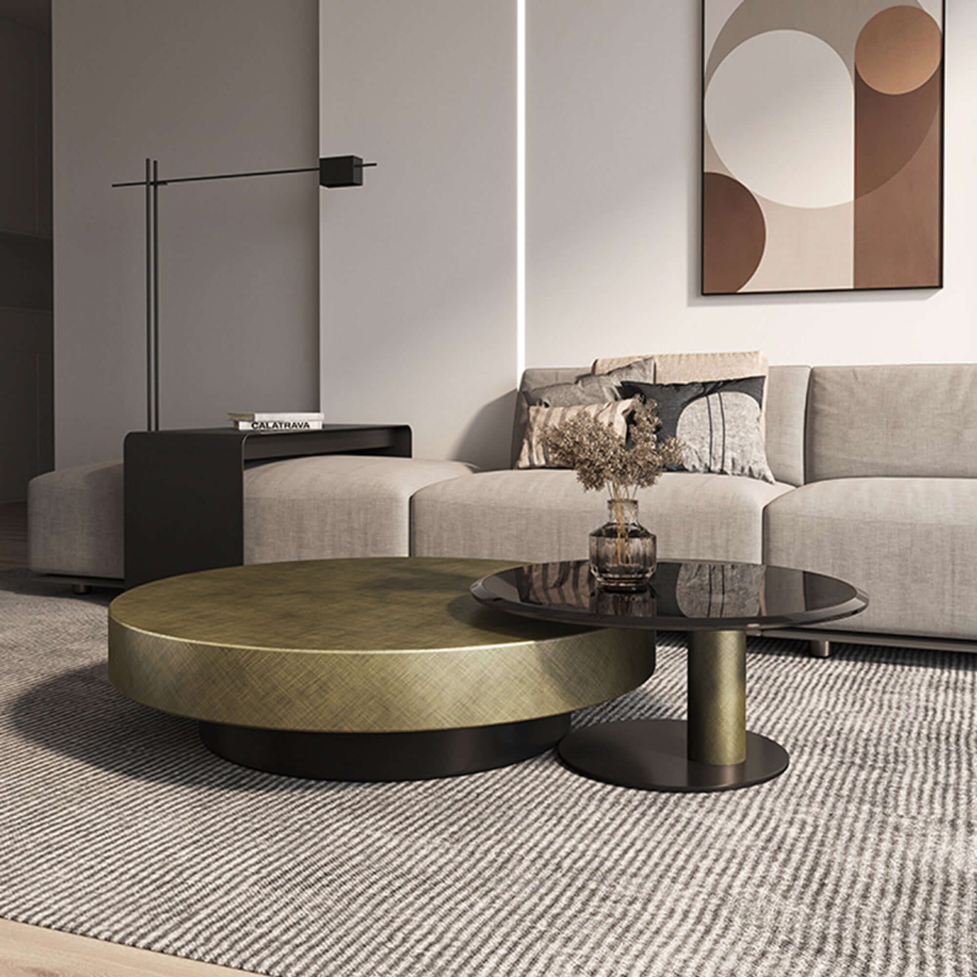 Set of two gold and black round nesting coffee tables with tempered glass tops