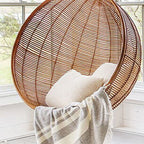 Climate-resistant metal porch swing with cushions, chain, and stand in unfinished color