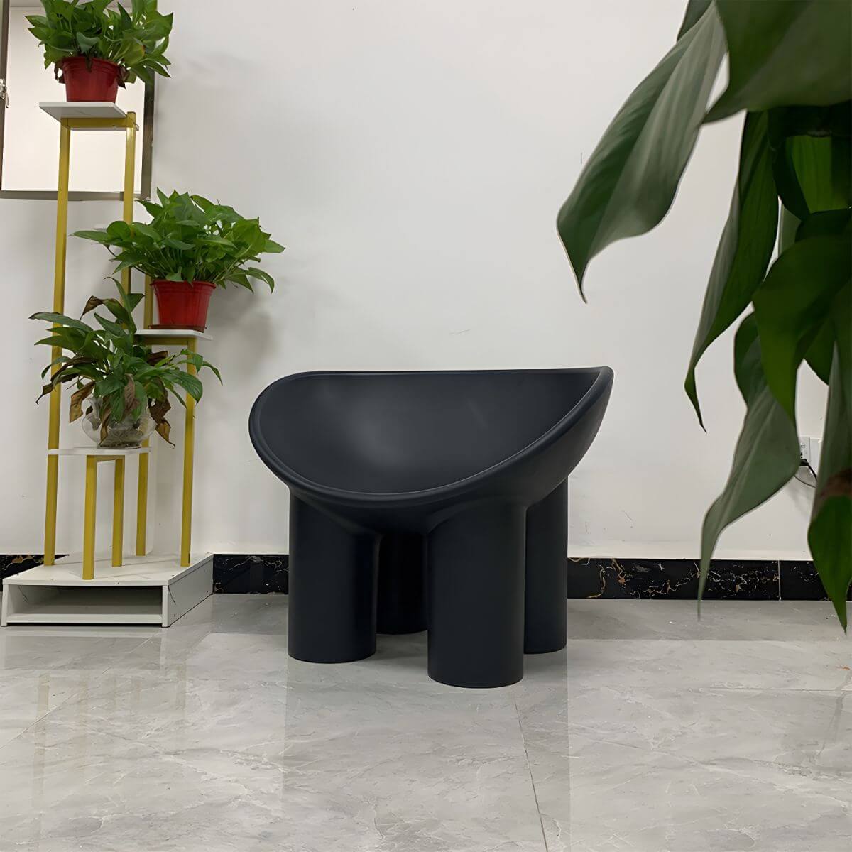 Modern armless papasan accent chair with bowl shape and elephant legs