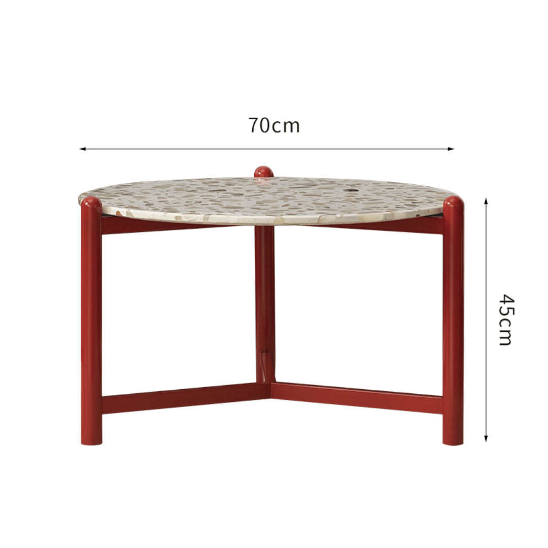 Round side table with vibrant red terrazzo top, featuring a modern minimalist design