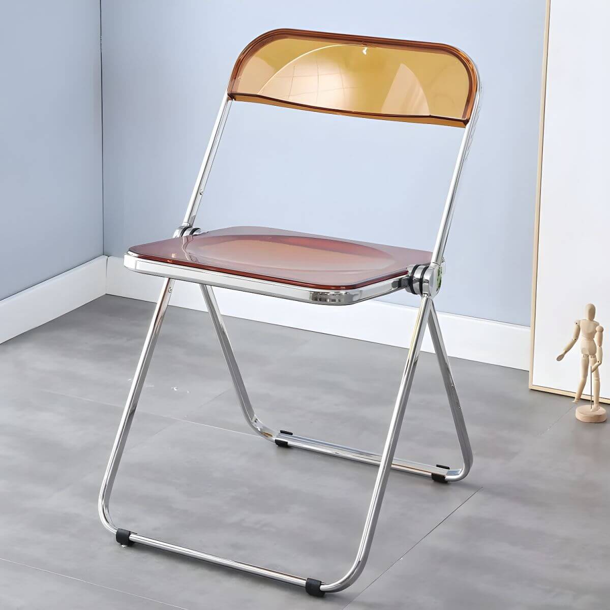 Scandinavian style dining chair with silver metal legs and plastic acrylic seat
