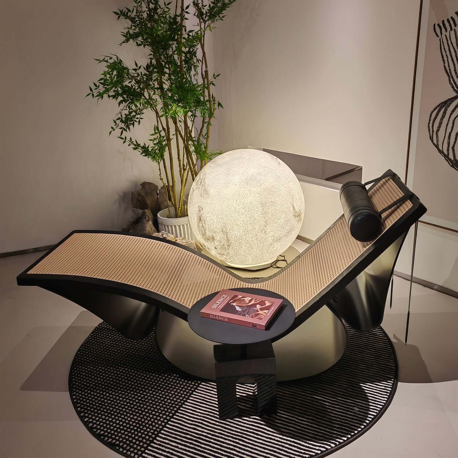 Black vintage chaise lounge chair made of cane wood with elegant design