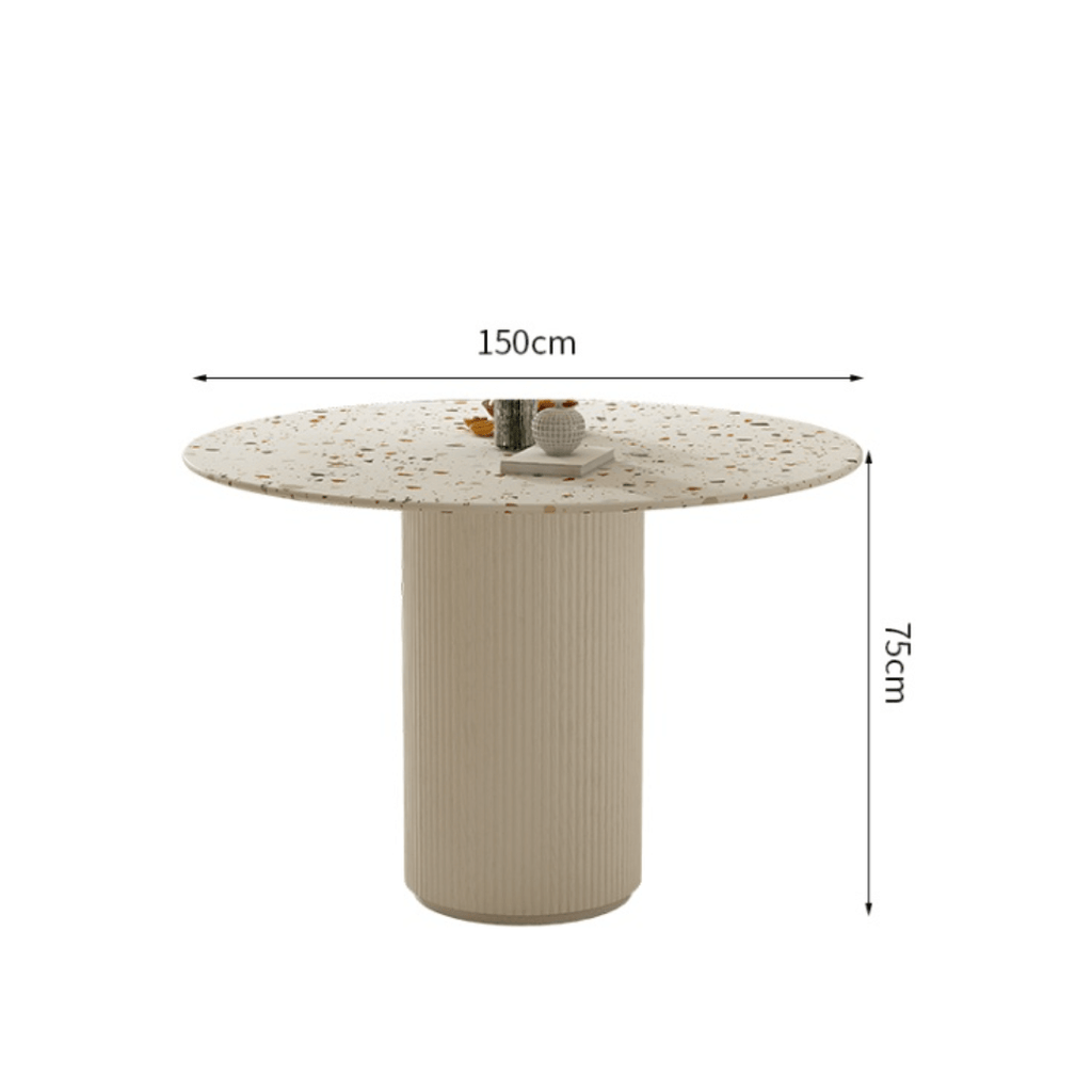 Round terrazzo dining table with soft wool upholstered chairs for a trendy home setup