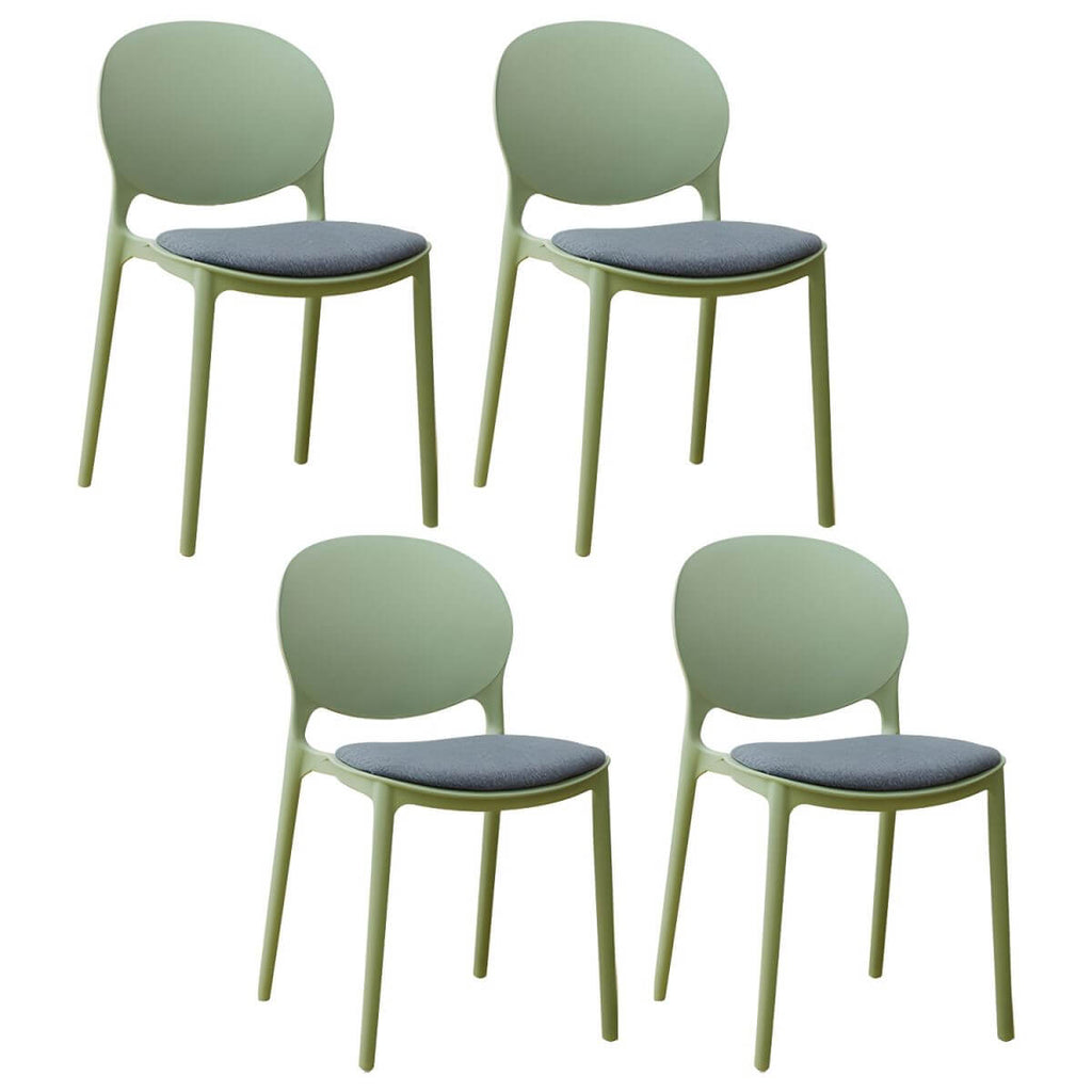 Scandinavian plastic dining chair with open back and four legs, ideal for home use
