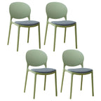 Scandinavian plastic dining chair with open back and four legs, ideal for home use