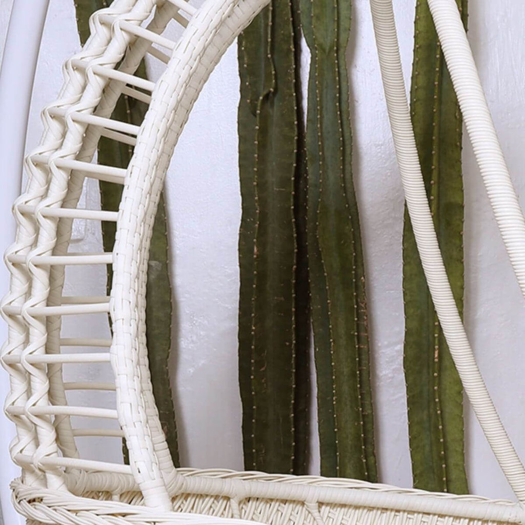 Metal porch swing with tropical olive green, auburn, and rose cushions, includes stand and chain