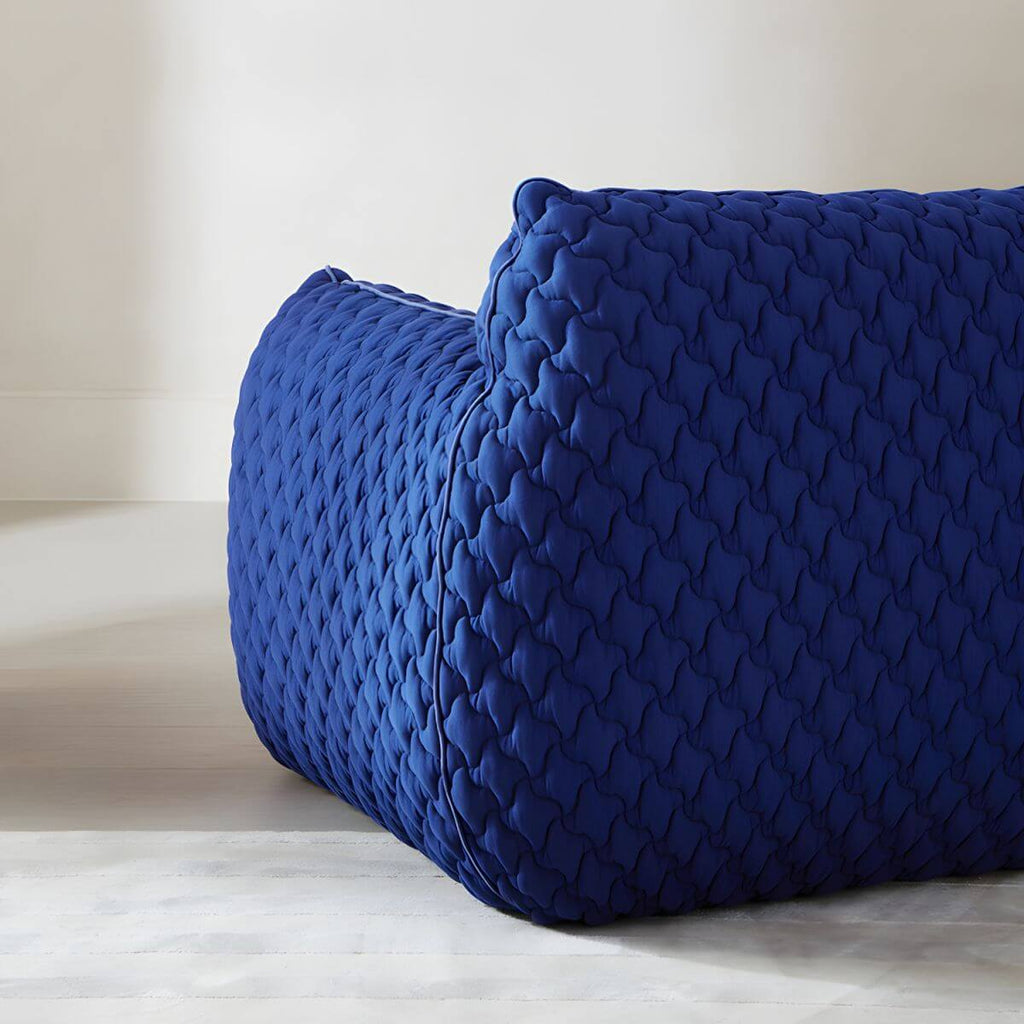 Light gray Scandinavian single sofa chair with polyester twill upholstery, ideal for bedroom seating