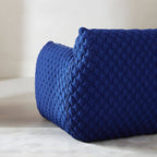 Light gray Scandinavian single sofa chair with polyester twill upholstery, ideal for bedroom seating