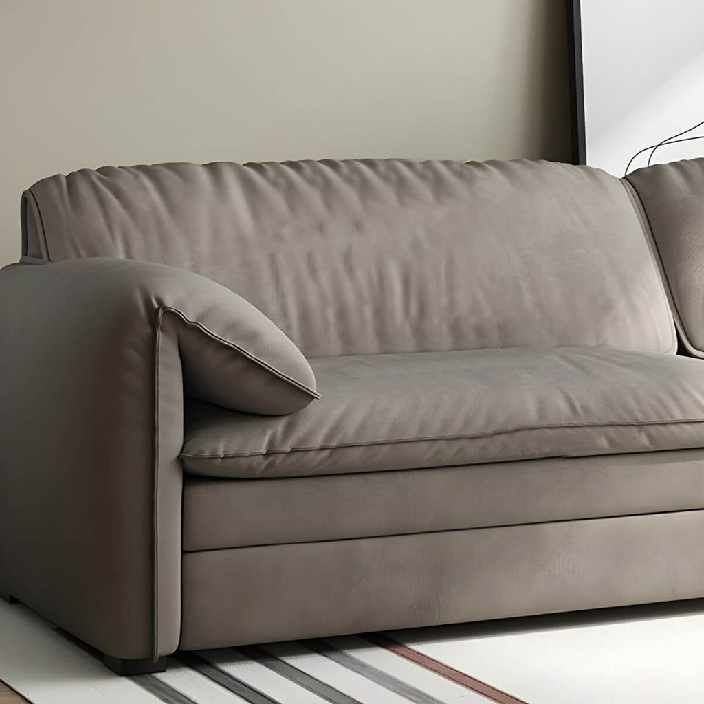 Gray Scandinavian sofa bed with fabric upholstery and coir faux leather sleeper, 69 inches long