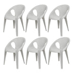 Stackable modern arm chair with open back made of plastic and acrylic for dining