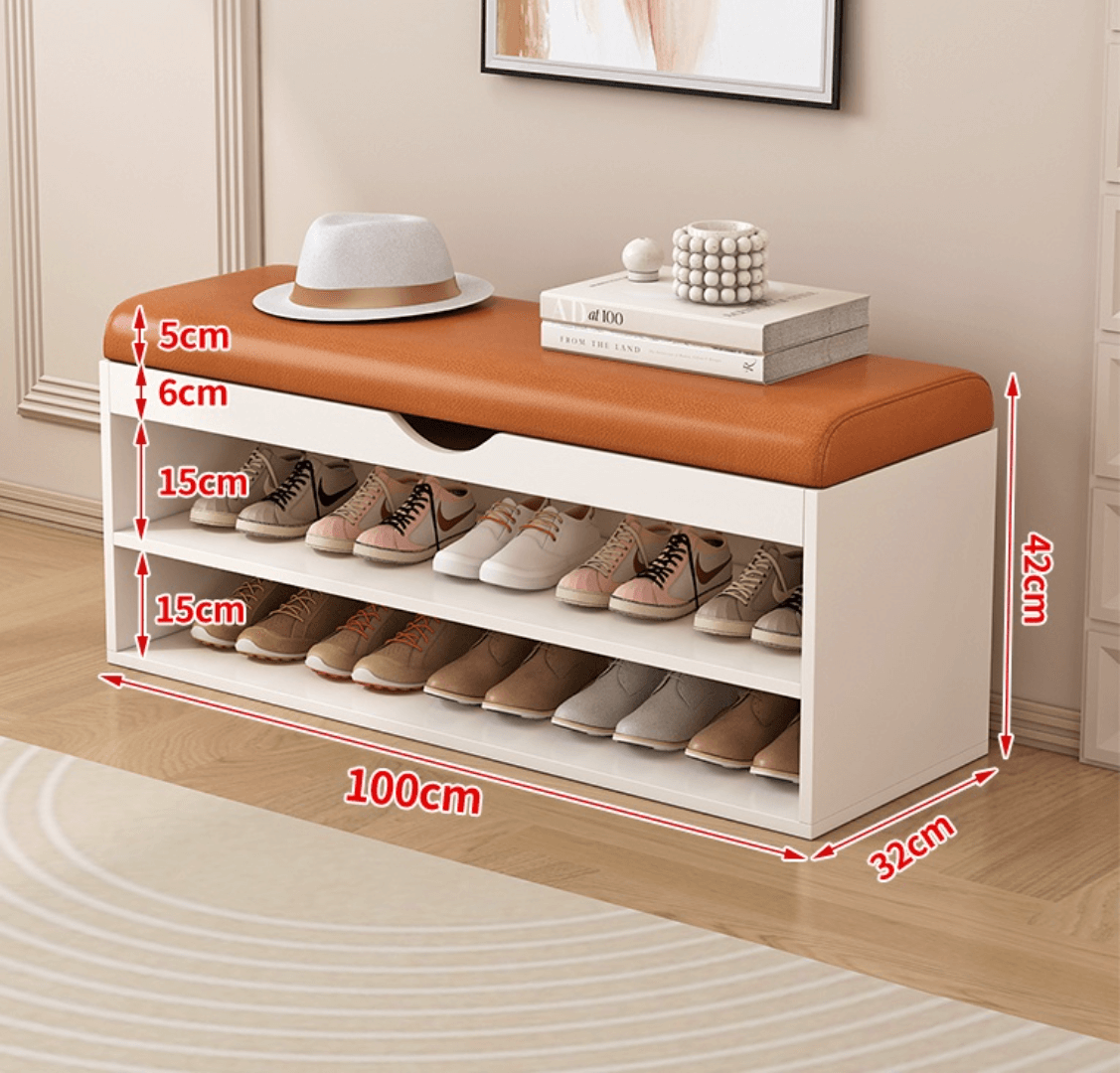 Modern white and orange shoe bench with upholstered seat and space-saving storage