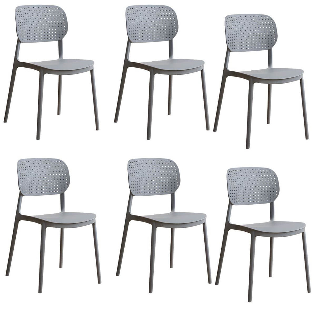 Stackable Scandinavian style plastic and acrylic side chair with low back for dining