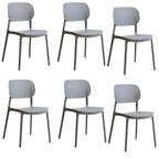 Stackable Scandinavian style plastic and acrylic side chair with low back for dining