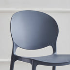 Modern acrylic dining side chair with open back, 32 inches tall, ideal for restaurant seating