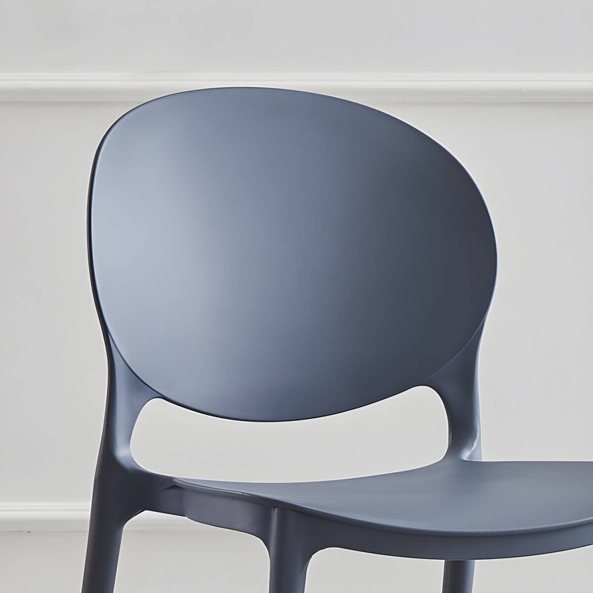 Modern acrylic dining side chair with open back, 32 inches tall, ideal for restaurant seating
