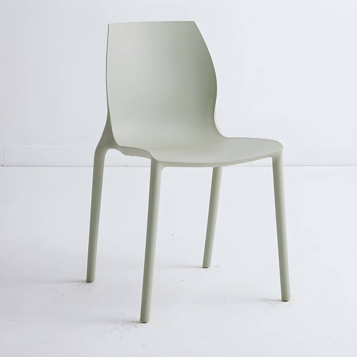 Stackable modern Scandinavian plastic and acrylic chair for kitchen and dining use