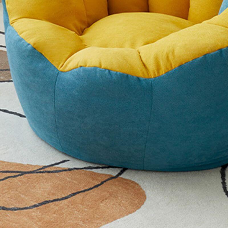 Lemon color cotton blend Papasan chair with slipcover and sewn pillow back accent