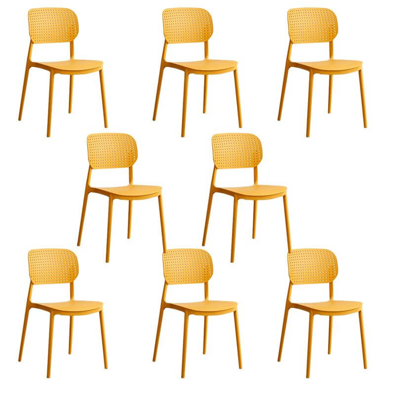 Stackable Scandinavian style plastic and acrylic side chair with low back for dining