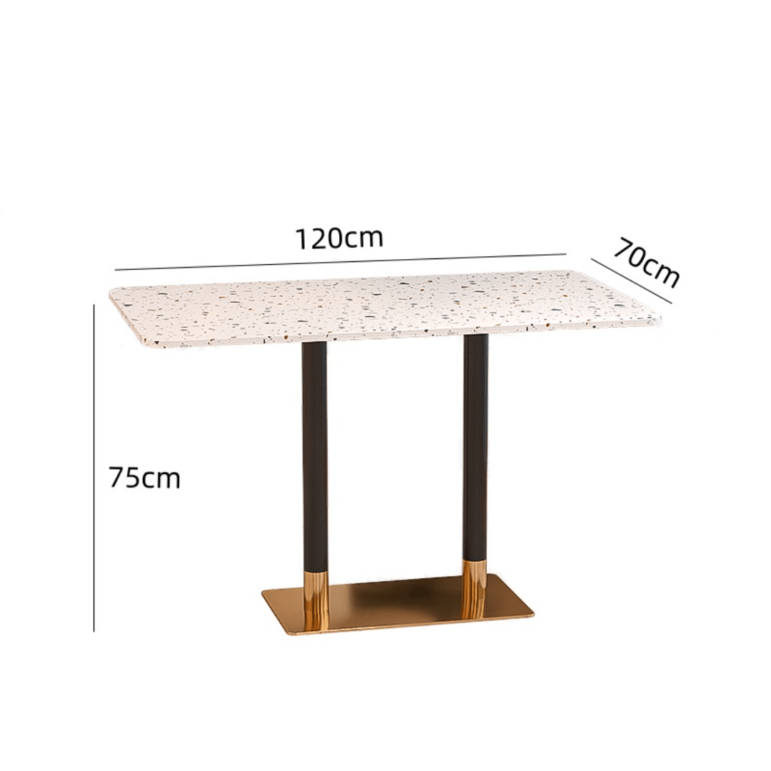 Rattan dining chairs with durable terrazzo table for an elegant dining setup