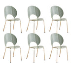 Stackable Scandinavian style dining chair with plastic seat, acrylic back, and silver legs